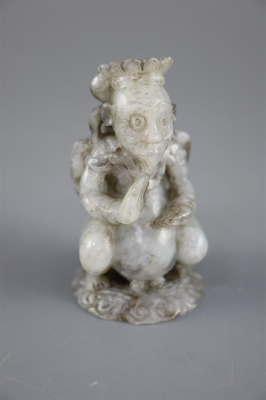 A Chinese grey jade figure, 6.4cm high